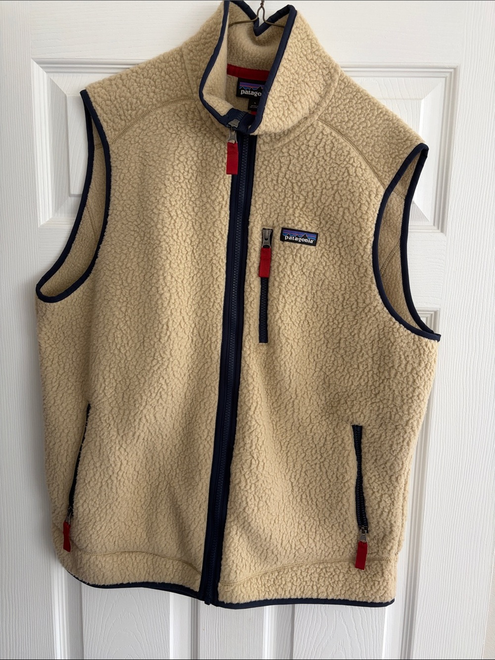 Patagonia Men’s Cream Sherpa Vest with Navy Trim and Red Pulls